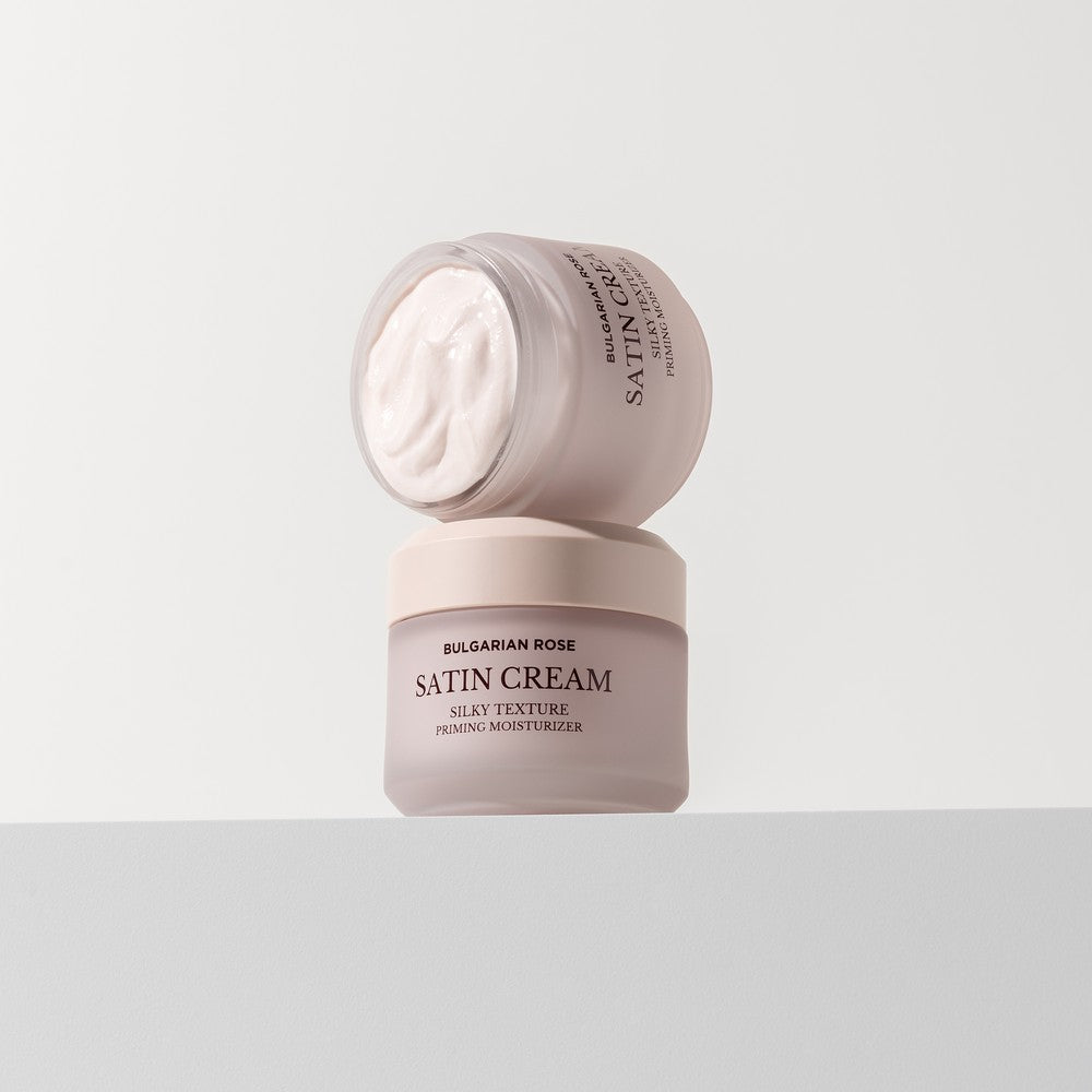 Applying Heimish Bulgarian Rose Satin Cream on face

